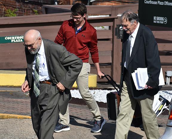 Randy Foster/editor@cherokeescout.com Former Cherokee County and Department of Social Services attorney Scott Lindsay (left) of Murphy leaves the Macon County Courthouse in downtown Franklin on Monday afternoon with his attorney, Jerry Townson (right), along with an unidentified person.