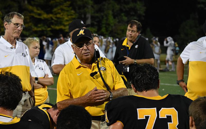 Murphy Coach David Gentry talks with the Bulldogs after beating Georgia Force Christian last week. Photo by Noah Shatzer