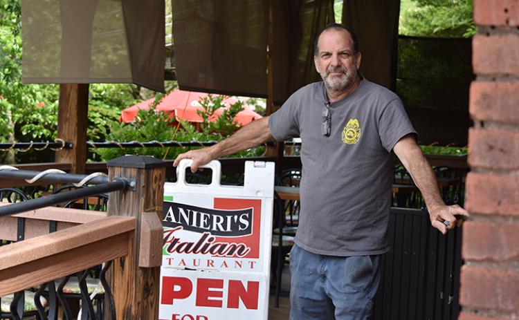 Frank Colontonio was happy to be able to open the indoor and outdoor dining areas at Granieri’s Italian Restaurant on Main Street in downtown Andrews starting Friday night. Photo by Samantha Sinclair