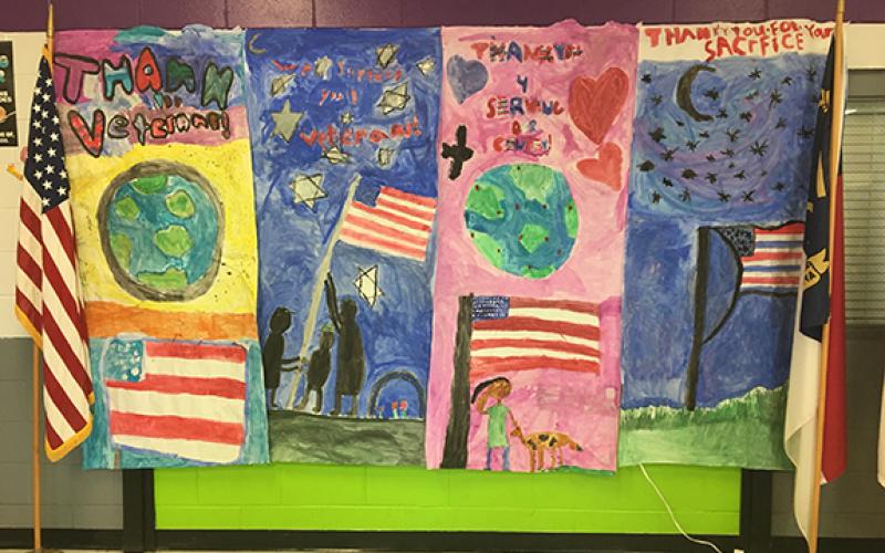 This mural was created by students at Peachtree Elementary School as part of their program honoring veterans Thursday.