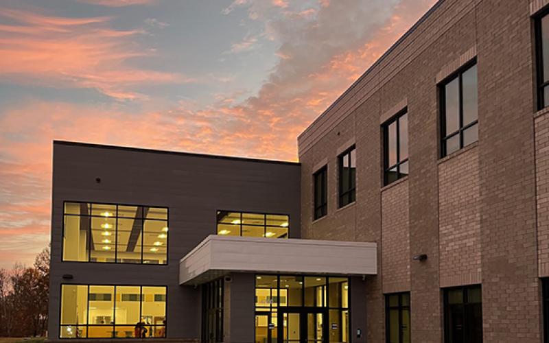 The Cherokee County Schools of Innovation & Technol- ogy’s main entrance at sunrise in Peachtree.