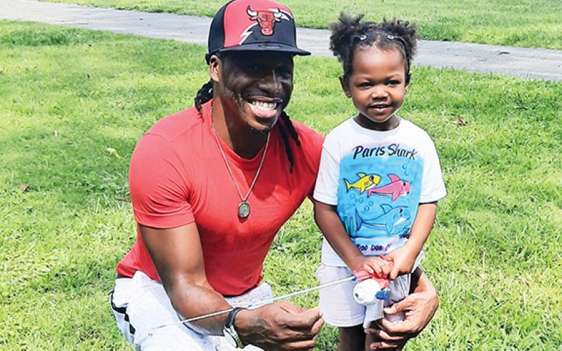 Matthew and 3-year-old Paris Owens had a blast participating in the Fishing Derby during the 2023 Hometown Celebration at Konehete Veterans Park in Murphy.