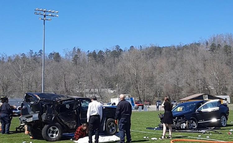 Anngee Quinones-Belian/Staff Correspondent The “Choices 2024” drunk-driving scenario at Murphy High School on March 19 utilized various transportation methods to evacuate patients, such as ambulances, a helicopter and even a hearse from Ivie Funeral Home.